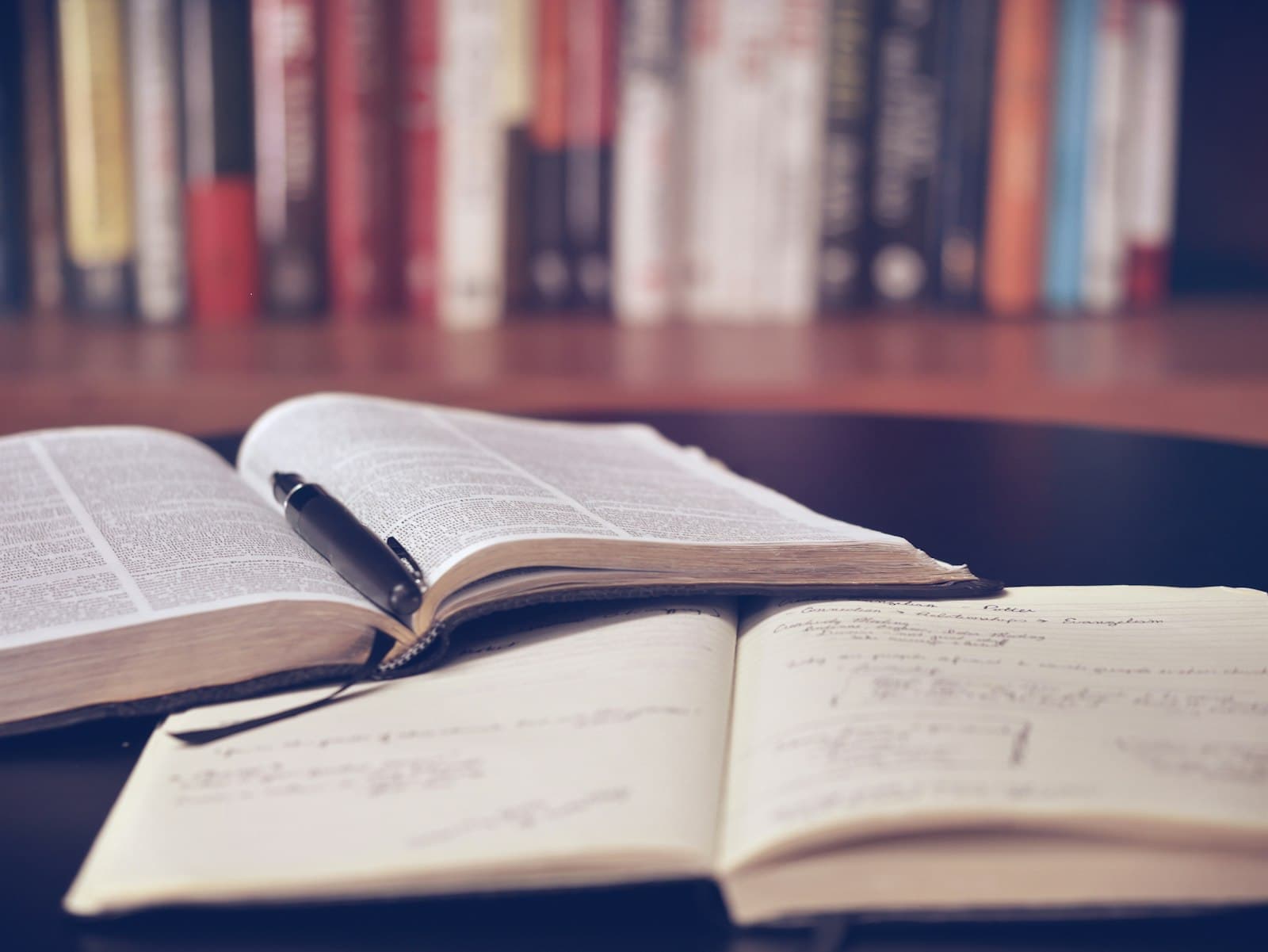 An open book on a wooden surface